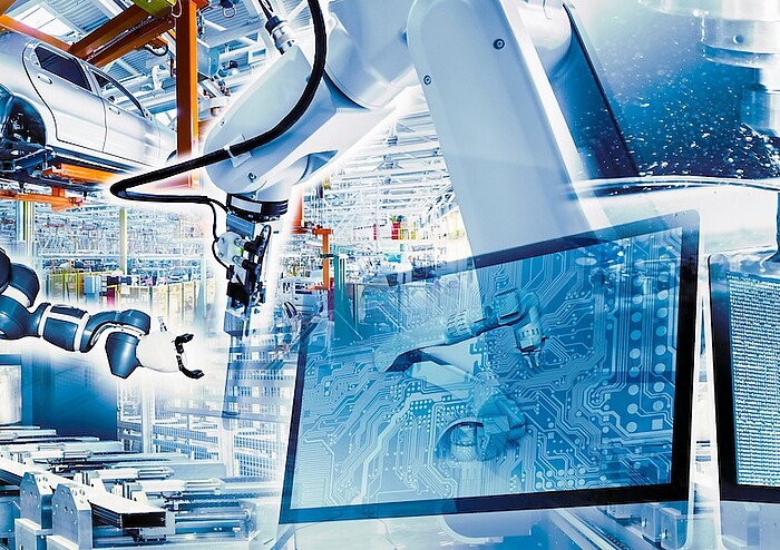 Industrieanlagen und Robotik als Symbolbild für unternehmerische Transformation und Innovation in der Industrie